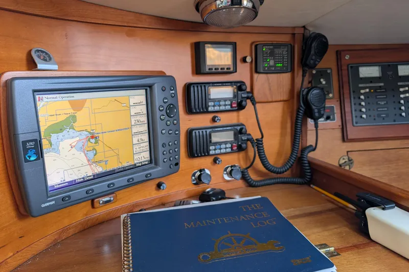 Slide: The Image of Navigation equipment and maintenance logbook on 1984 Ohlson 38 sailboat. - 23