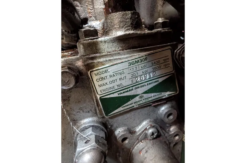 Slide: The Image of Yanmar diesel engine model 3GM30F label on Ohlson 38, 1984. - 29