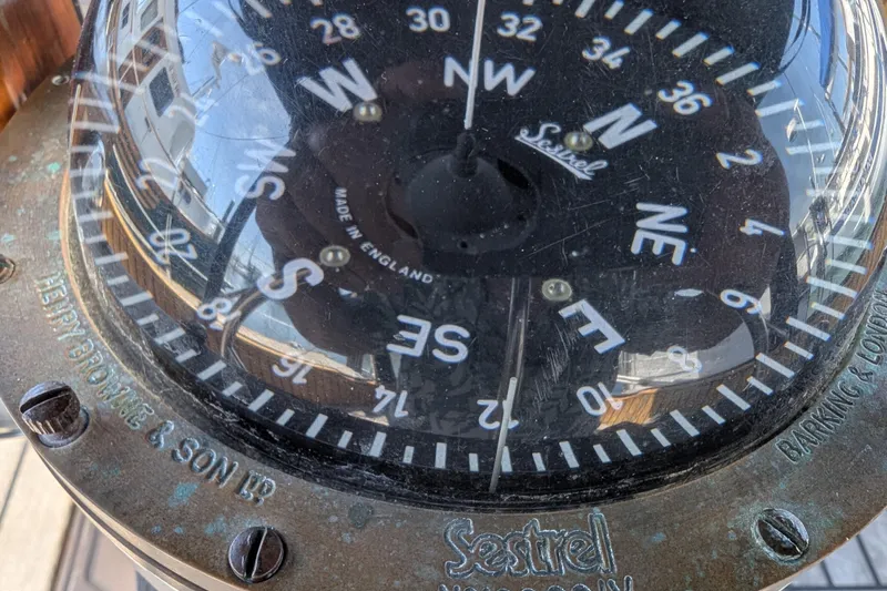 Slide: The Image of Close-up of a vintage Sestrel compass on a 1984 Ohlson 38 sailboat. - 37