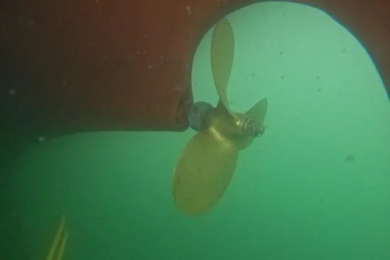 Slide: The Image of Underwater view of a 1984 Ohlson 38 boat propeller. - 59