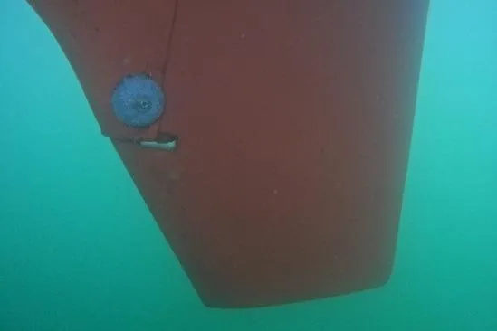 Slide: The Image of Underwater view of 1984 Ohlson 38 sailboat rudder in clear water. - 60