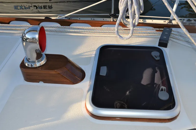 Slide: The Image of Deck of 1984 Ohlson 38 sailboat with hatch and chrome vent. - 9