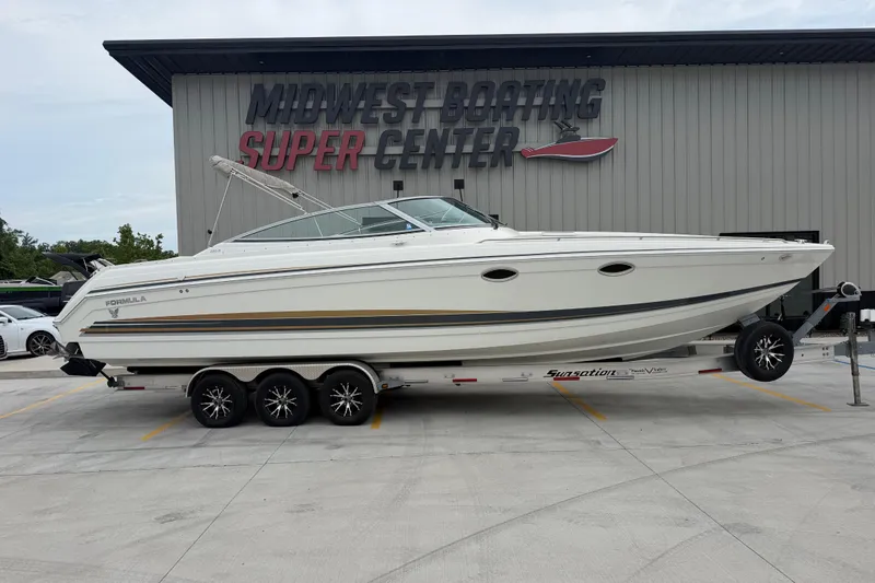 The Image of 2002 Formula 330 Sun Sport boat on trailer at Midwest Boating Super Center. - 1
