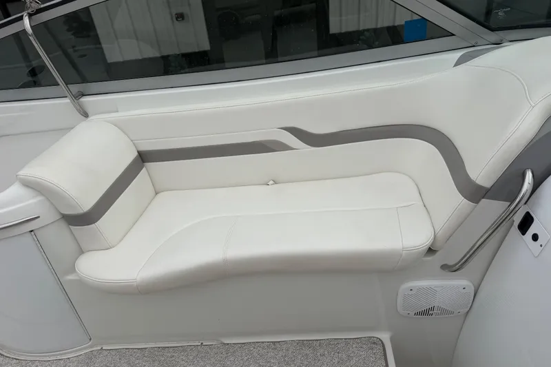 Slide: The Image of 2002 Formula 330 Sun Sport boat interior with white and gray seating. - 17