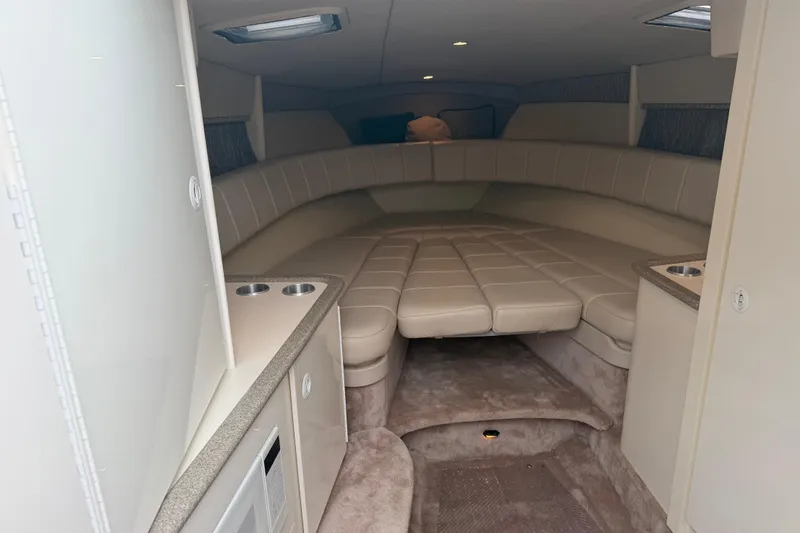 Slide: The Image of Interior of 2002 Formula 330 Sun Sport boat, featuring spacious seating and modern amenities. - 22