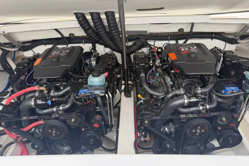 Slide: The Image of Twin MerCruiser engines in a 2002 Formula 330 Sun Sport boat. - 32