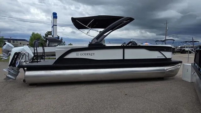 Slide: The Image of 2026 Godfrey Monaco 235 SB iMPACT pontoon boat on display. - 4