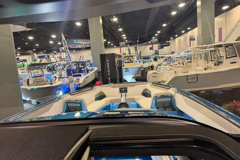 Slide: The Image of Boat show featuring the 2028 Nor-Tech 42 Eleven, surrounded by various luxury boats. - 11