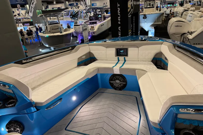 Slide: The Image of Luxurious seating area on the 2028 Nor-Tech 42 Eleven boat at a marine exhibition. - 15