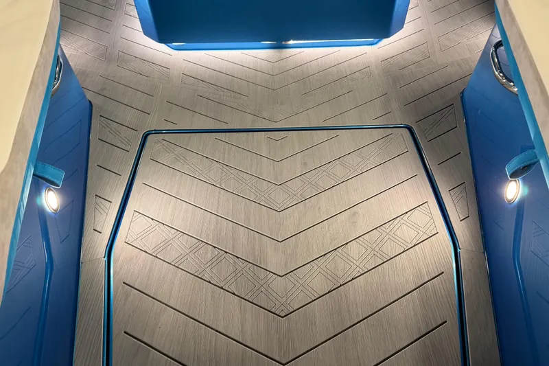 Slide: The Image of Interior of 2028 Nor-Tech 42 Eleven boat with modern, illuminated flooring design. - 16