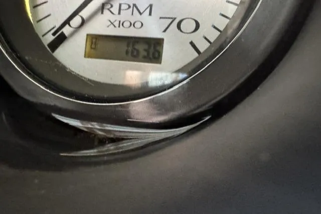 Slide: The Image of Close-up of a 2022 Bennington 22 SLX RPM gauge displaying 1636 RPM. - 11