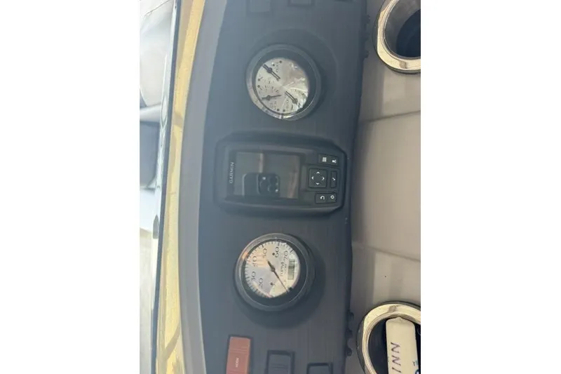 Slide: The Image of Dashboard of a 2022 Bennington 22 SLX boat with gauges and controls. - 12