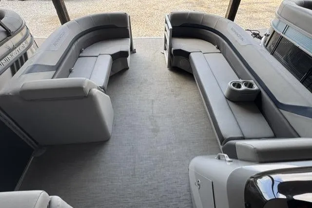 Slide: The Image of 2022 Bennington 22 SLX pontoon boat interior with spacious seating and cup holders. - 5