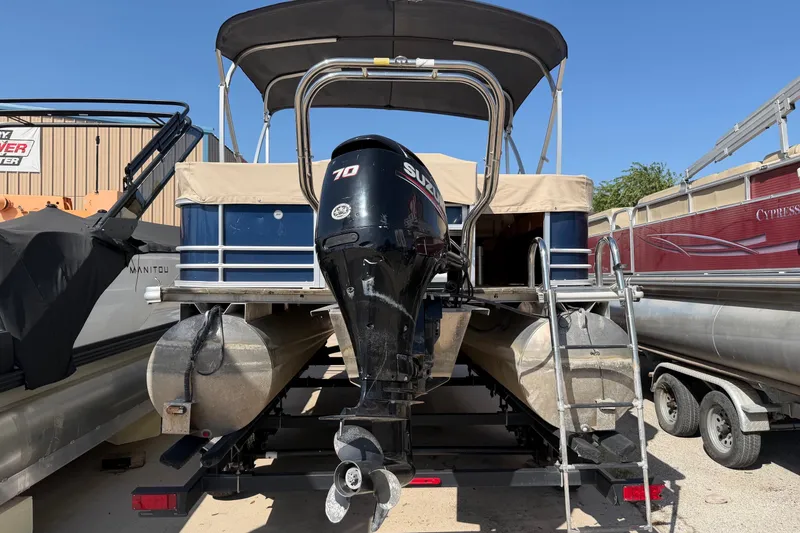 Slide: The Image of 2019 SunChaser Geneva Cruise 20 4.0 Fish pontoon boat with Suzuki outboard motor. - 4
