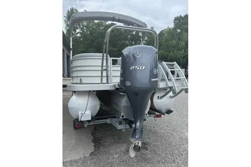 Slide: The Image of 2021 Bennington 24 LRSC pontoon boat with Yamaha 250 outboard motor, rear view. - 12