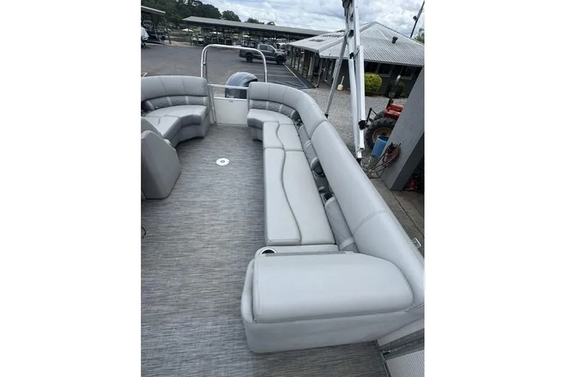 Slide: The Image of 2021 Bennington 24 LRSC pontoon boat with spacious seating and modern design. - 5