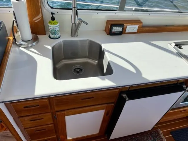 Slide: The Image of Interior of Duffy 35 Hardtop Cruiser with sink and countertop. - 13