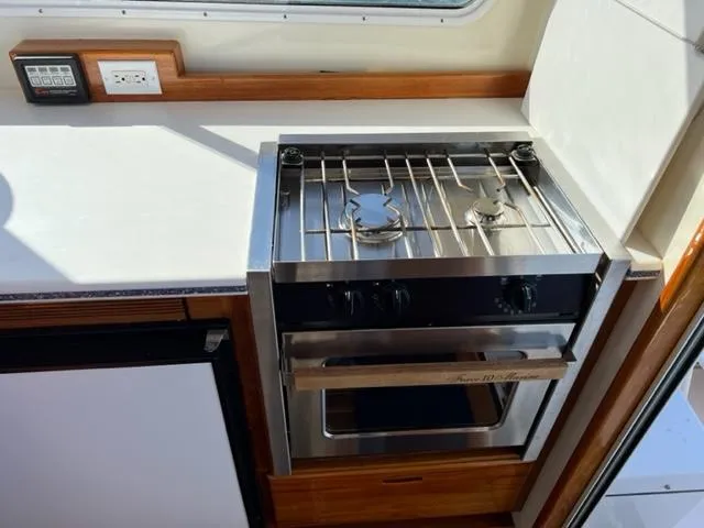 Slide: The Image of Galley area in a 2000 Duffy 35 Hardtop Cruiser. - 14