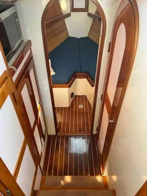 Slide: The Image of Interior of 2000 Duffy 35 Hardtop Cruiser with wooden flooring. - 19