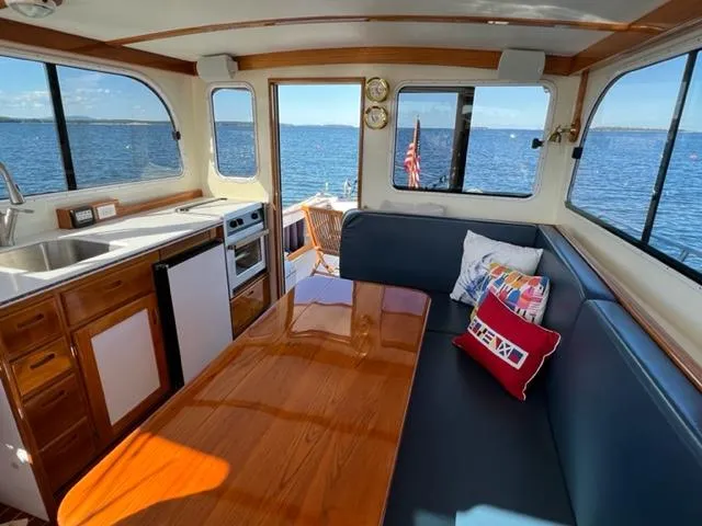 Slide: The Image of Interior of a 2000 Duffy 35 Hardtop Cruiser with ocean view. - 2