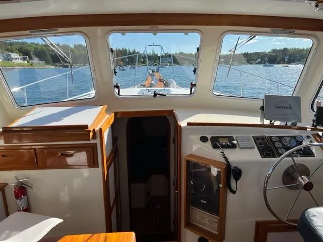 Slide: The Image of Interior view of 2000 Duffy 35 Hardtop Cruiser on the water. - 26