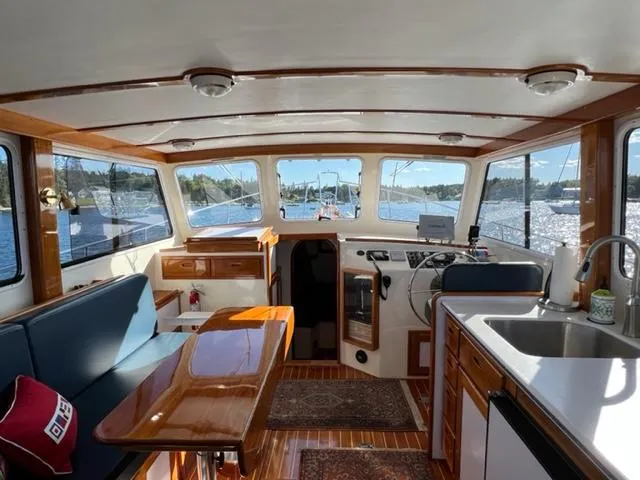 Slide: The Image of Interior of a 2000 Duffy 35 Hardtop Cruiser with wood finish. - 28