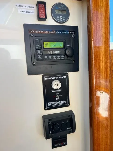Slide: The Image of Duffy 35 Hardtop Cruiser control panel with instruments. - 30