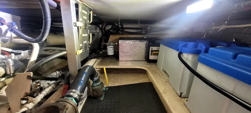 Slide: The Image of Engine room of a 2000 Duffy 35 Hardtop Cruiser with batteries and wiring. - 35