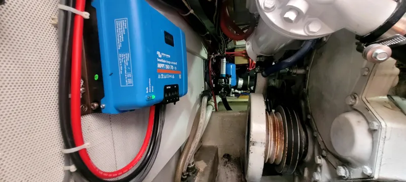 Slide: The Image of Engine room of a 2000 Duffy 35 Hardtop Cruiser with blue electronics. - 43