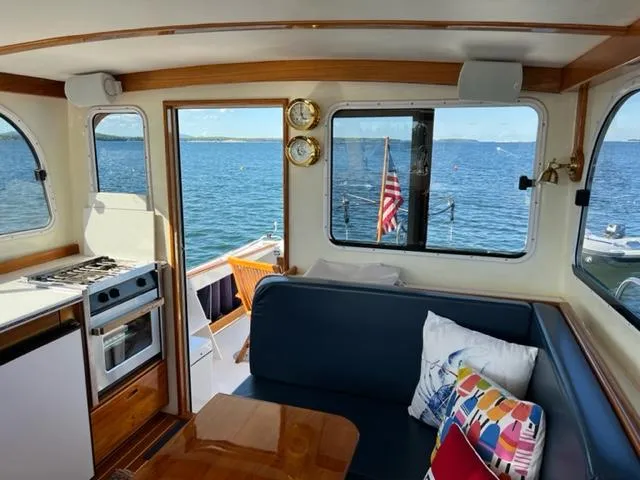 Slide: The Image of Interior of a 2000 Duffy 35 Hardtop Cruiser with ocean view. - 5