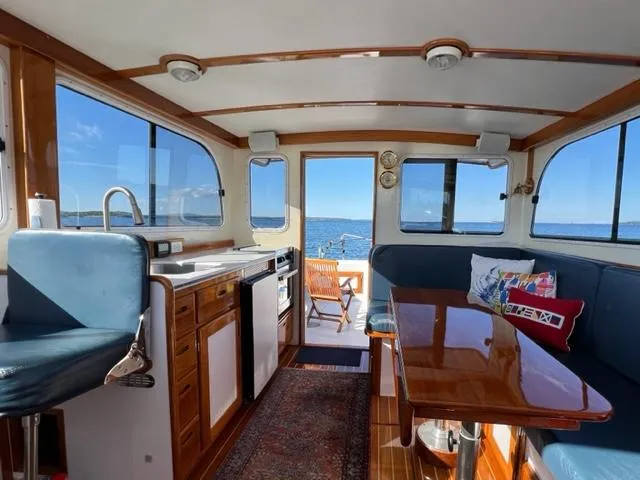 Slide: The Image of Interior of a 2000 Duffy 35 Hardtop Cruiser with ocean view. - 7