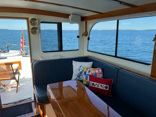 Slide: The Image of Interior of a 2000 Duffy 35 Hardtop Cruiser with ocean view. - 9