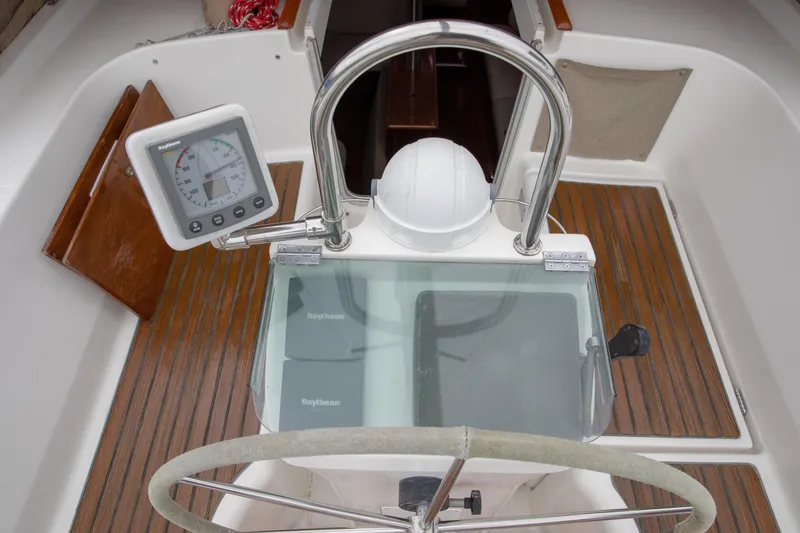 Slide: The Image of Cockpit of 1999 Beneteau Oceanis 36 CC sailboat with Raytheon navigation equipment. - 15