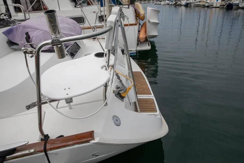 Slide: The Image of Stern view of 1999 Beneteau Oceanis 36 CC yacht docked in marina. - 56