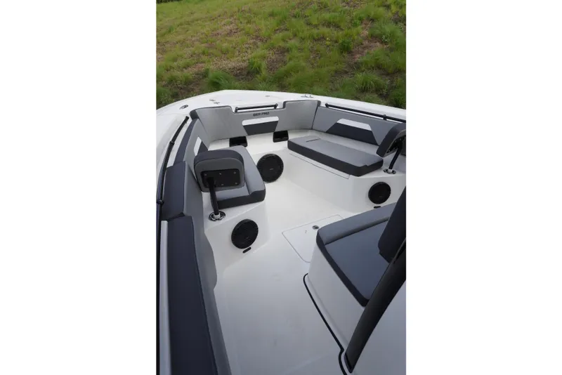 Slide: The Image of 2025 Sea Pro 292 DLX boat interior with sleek seating and modern design. - 9