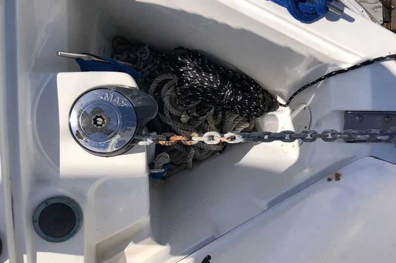 Slide: The Image of Anchor chain and ropes on a 2000 Catalina 36 MkII sailboat deck. - 14