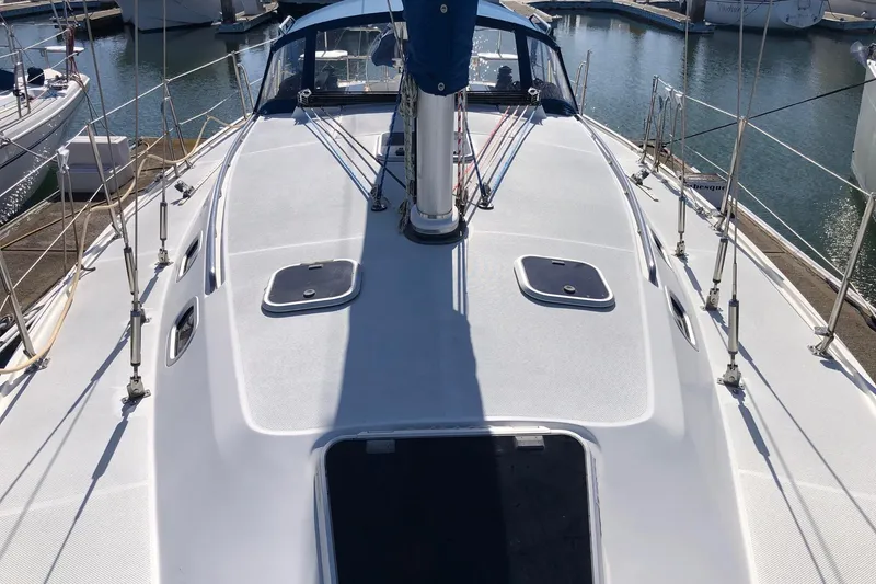 Slide: The Image of Catalina 36 MkII 2000 sailboat deck view, featuring hatches and rigging. - 15