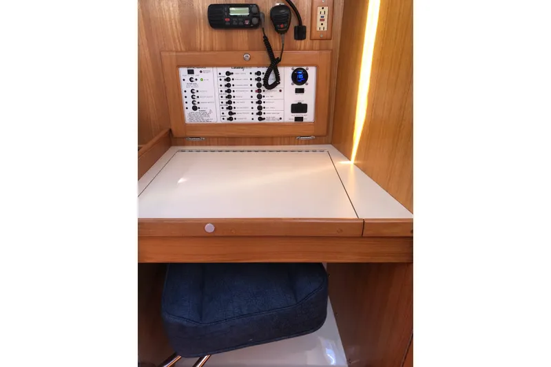 Slide: The Image of Navigation station of 2000 Catalina 36 MkII sailboat with control panel and radio. - 4