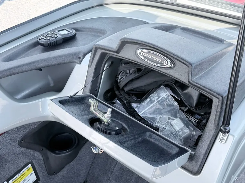 Slide: The Image of 2017 Tracker Targa V-18 Combo boat console with storage compartment. - 10