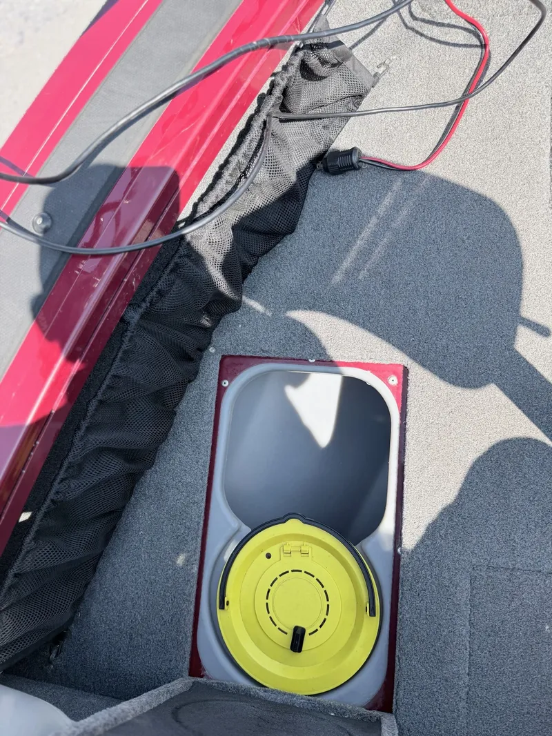 Slide: The Image of 2017 Tracker Targa V-18 Combo boat with yellow floor hatch. - 15
