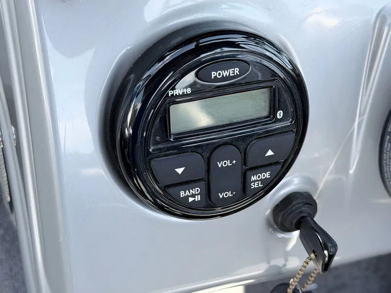 Slide: The Image of 2017 Tracker Targa V-18 Combo control panel with controls. - 22