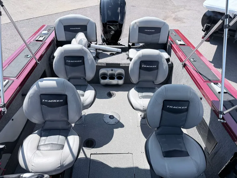 Slide: The Image of Interior view of a 2017 Tracker Targa V-18 Combo boat with gray seats. - 23