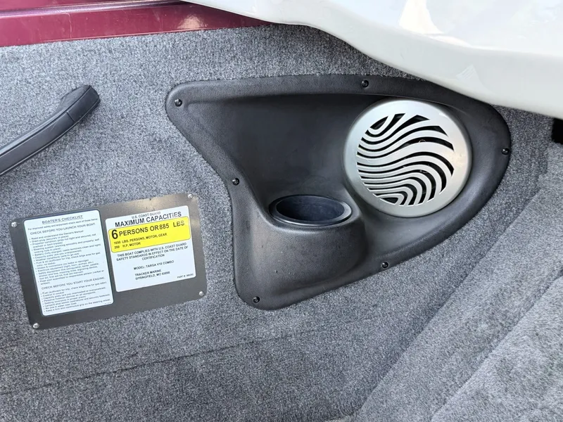 Slide: The Image of Interior of 2017 Tracker Targa V-18 Combo with speaker and capacity label. - 25