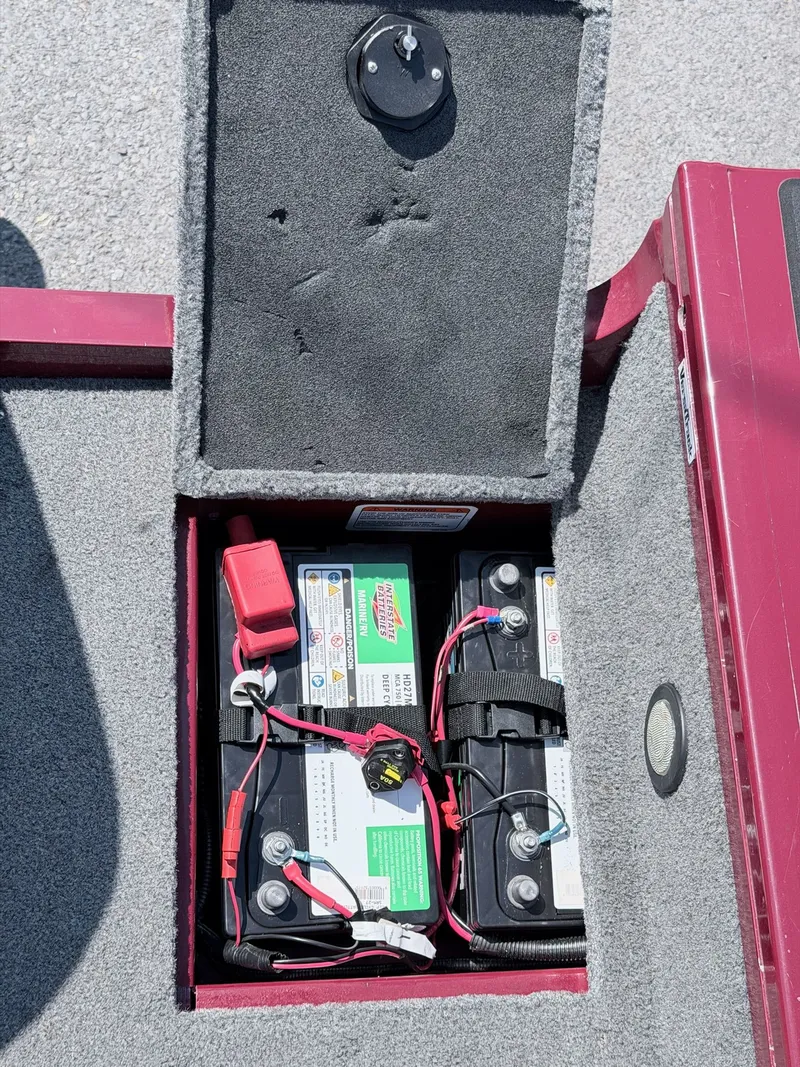 Slide: The Image of Battery compartment of a 2017 Tracker Targa V-18 Combo boat. - 26
