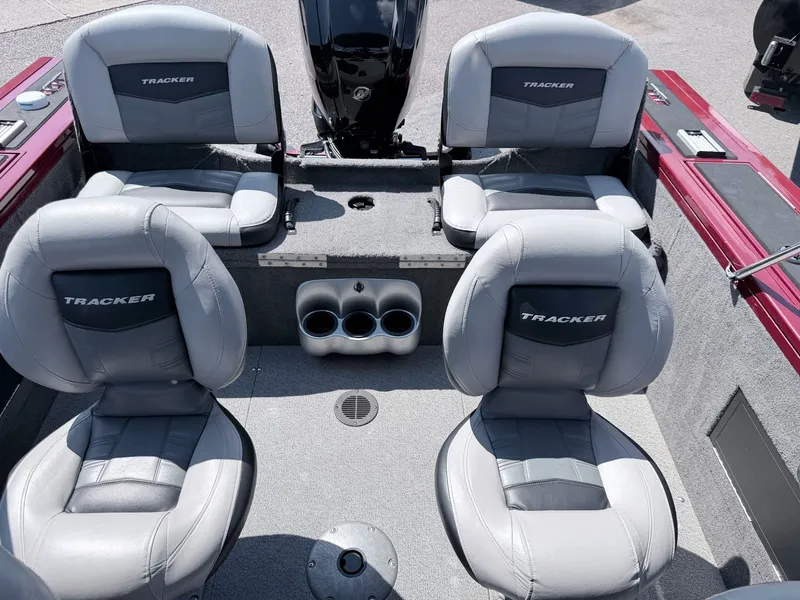 Slide: The Image of Interior of a 2017 Tracker Targa V-18 Combo boat with four seats. - 32