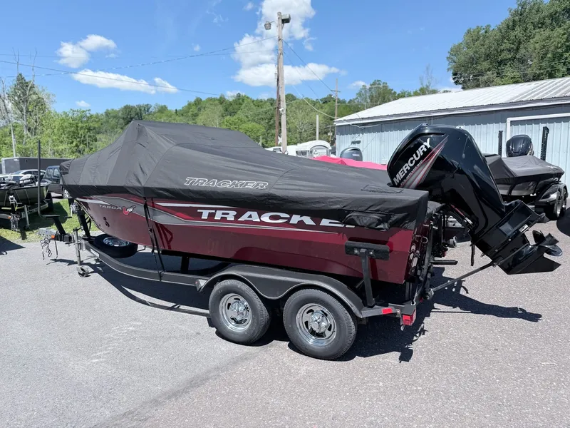 Slide: The Image of 2017 Tracker Targa V-18 Combo boat with cover on trailer. - 9