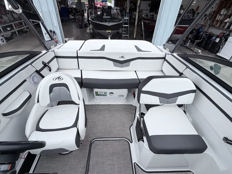 Slide: The Image of Interior of a 2020 Monterey M-20 boat with white seating. - 10