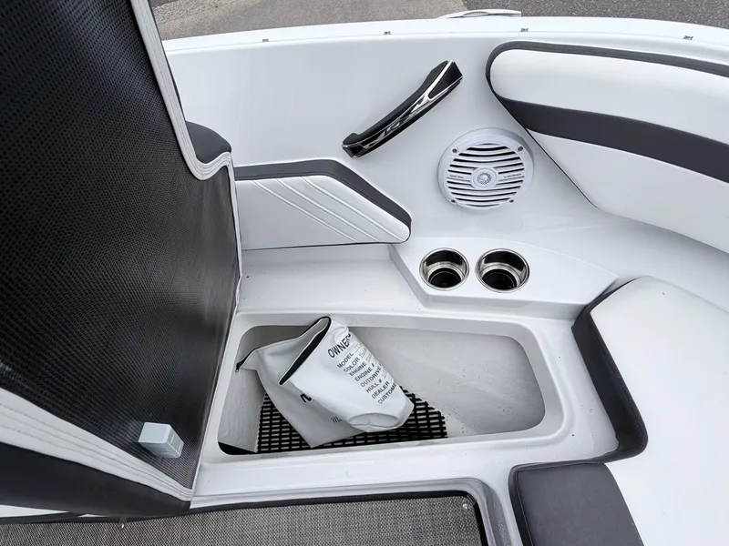 Slide: The Image of Interior of Monterey M-20 boat, featuring speaker and storage compartment. - 11