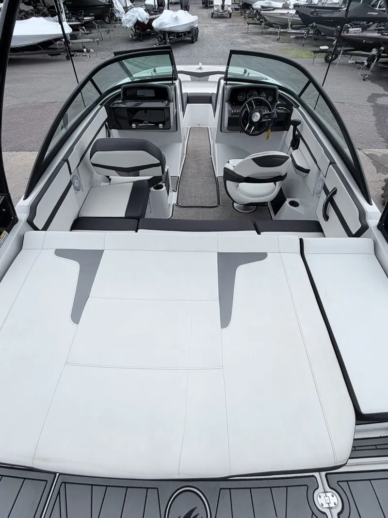 Slide: The Image of Interior of 2020 Monterey M-20 boat, featuring modern seating and helm console. - 12