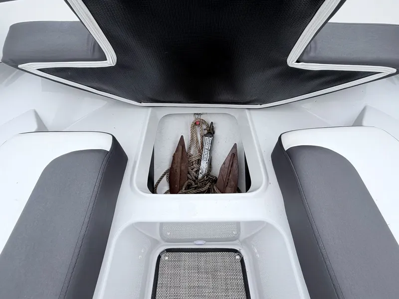 Slide: The Image of 2020 Monterey M-20 boat with anchor compartment and seating area. - 14